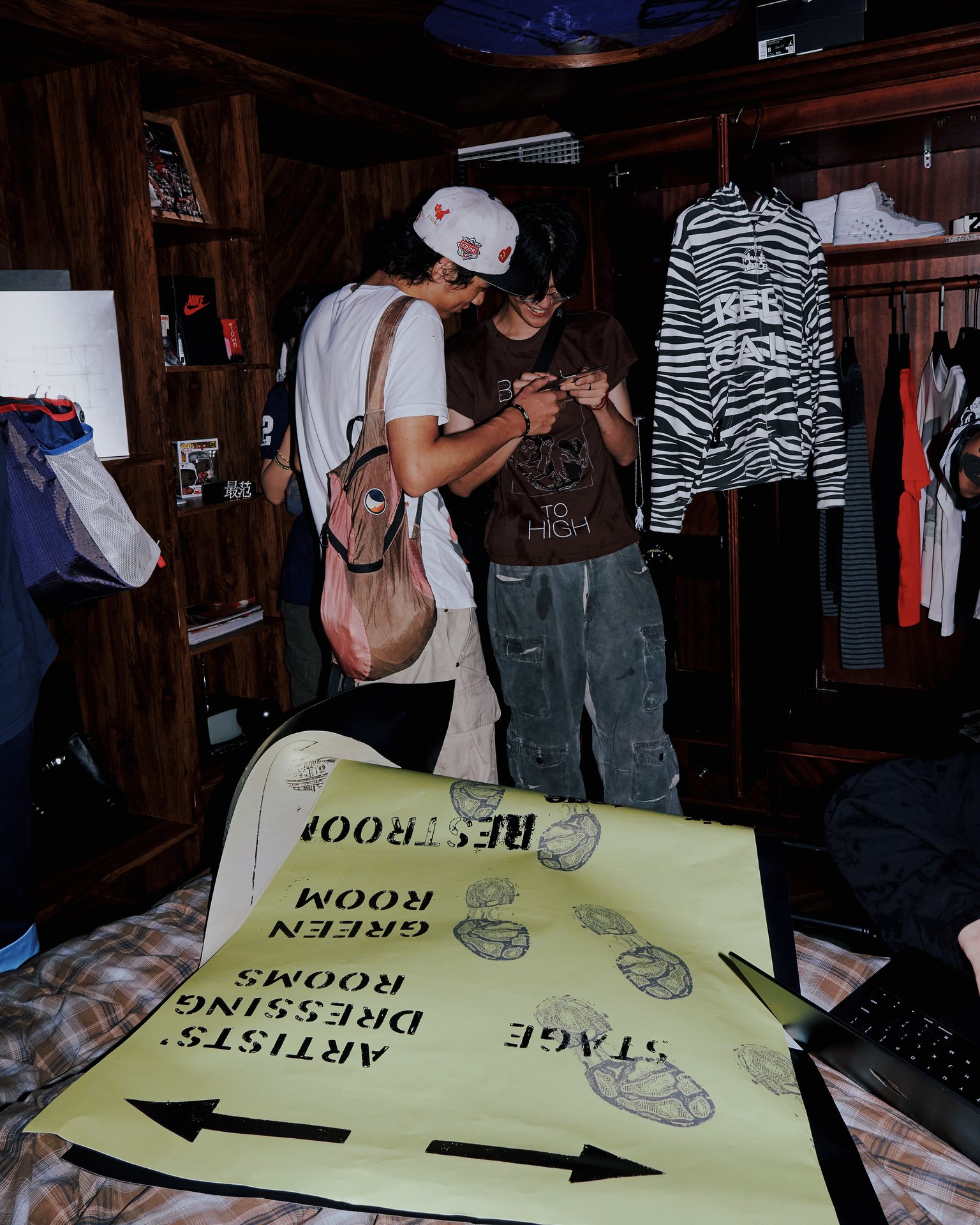 Greenroom with Jordan archive pieces and Backstage signage