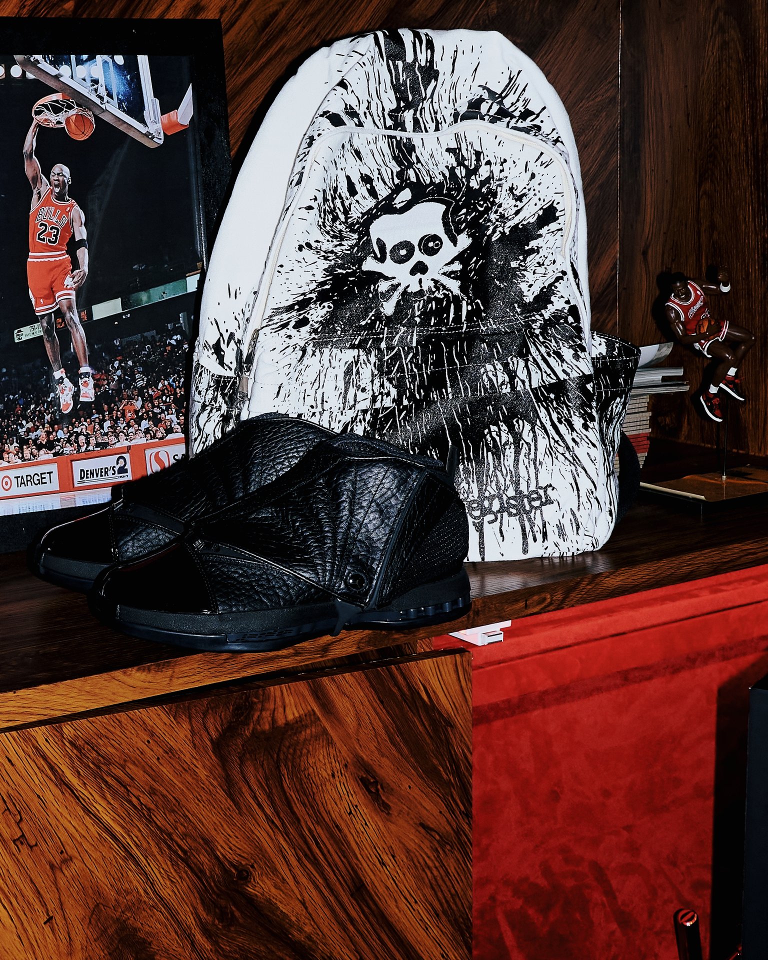 Human Register backpack and Jordan shoes displayed alongside Michael Jordan memorabilia